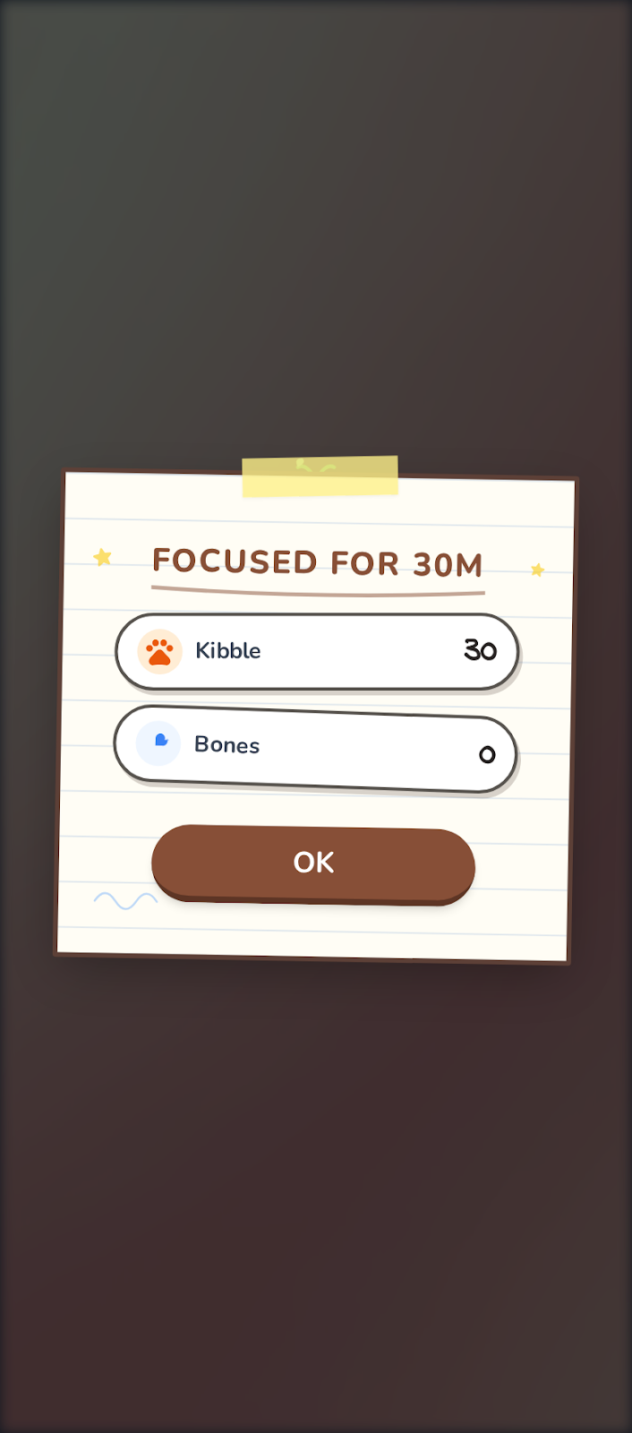 A success popout displayed in PuppyFocus after completing a concentration session, detailing the earned Kibble and Bone rewards as positive reinforcement.